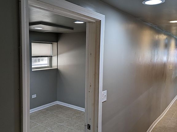 First bedroom door and hallway shown