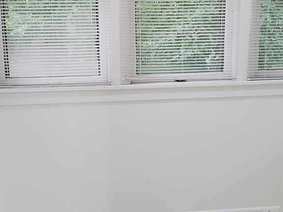 Looking into the sunroom from the bedroom.