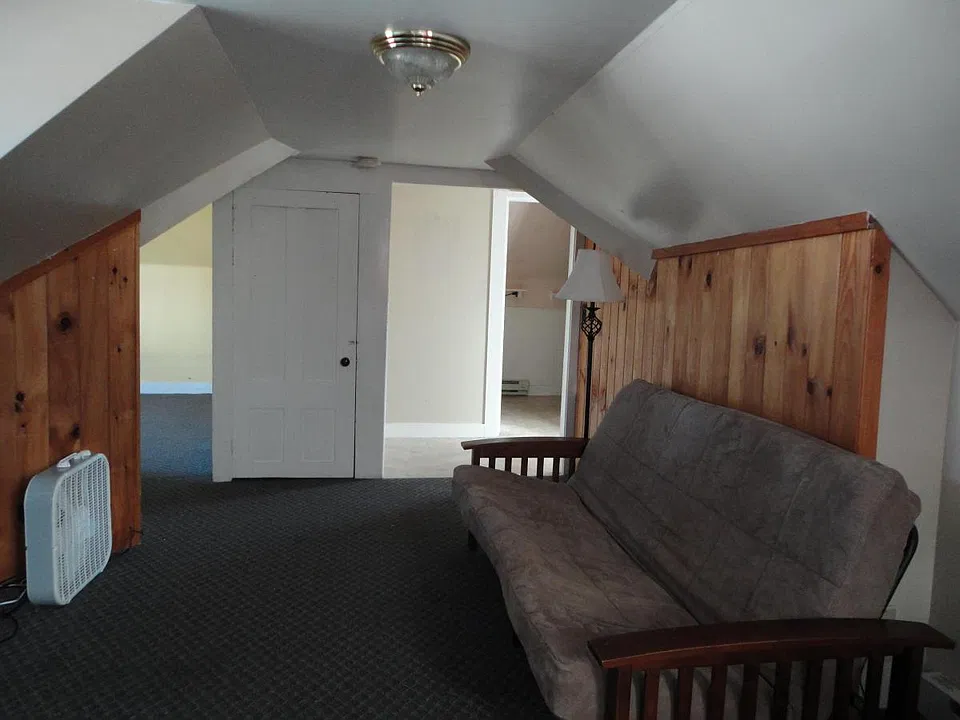 living room to bathroom at right and left to bedroom