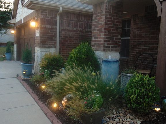 Water Fountain and Flower Beds