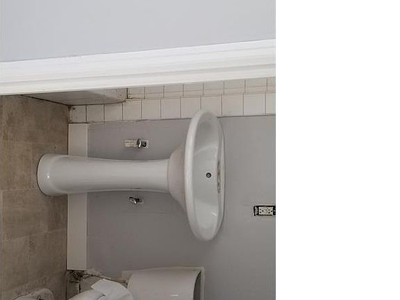 5th image of 9523 S San Pedro St