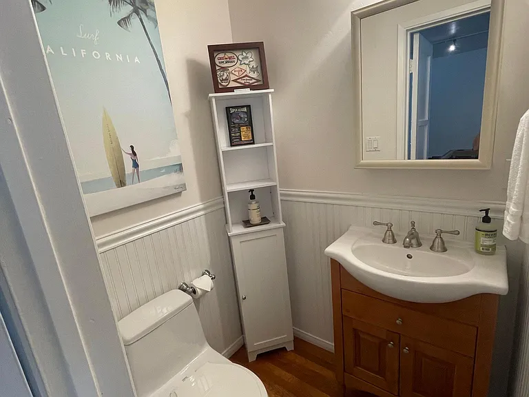 Gentleman's half bath. The shower for this is OUTSIDE (surf shower) and is not heated