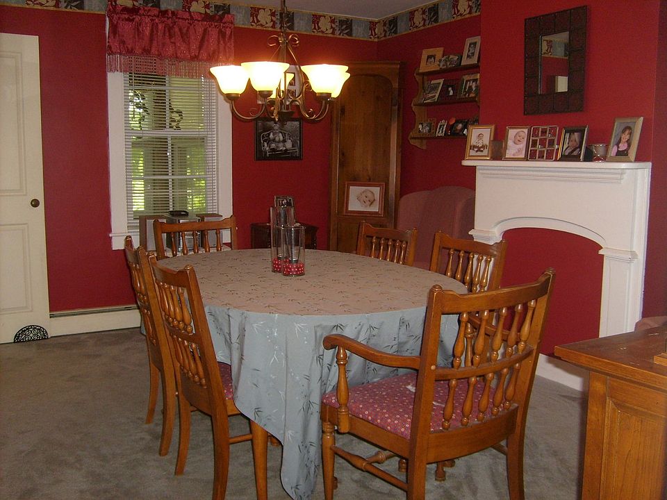 The large formal dining room can easily seat eight.