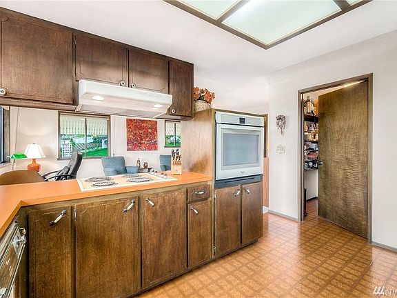 Lots of cabinet and counter space. Also walk-in pantry