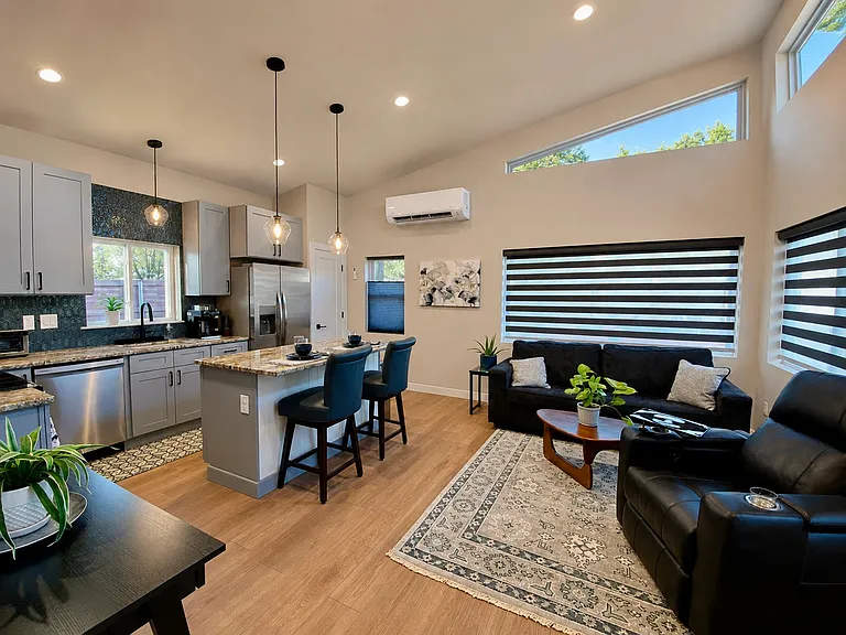 Layered shades and dimmers provide ultimate light and privacy control. Heat and AC are provided by a super-efficient mini-split: great comfort at a low utility price point.