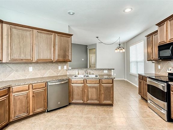 4th image of 9201 Sweeney Ct