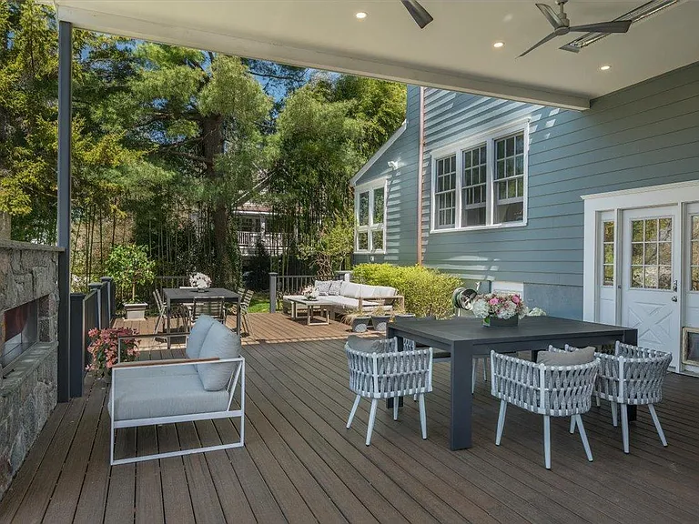 View of back patio from the outdoor kitchen.