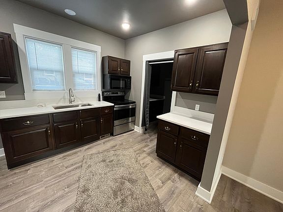 Luxury vinyl flooring in kitchen, baths, dining room and laundry room