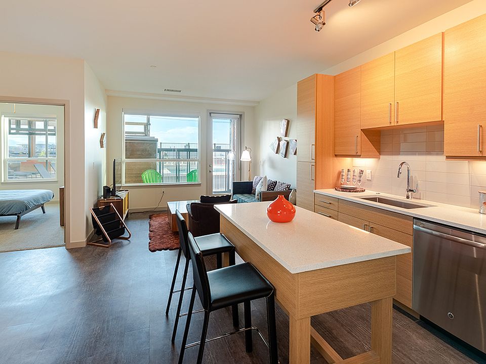 Kitchen area with stainless steel appliances and island