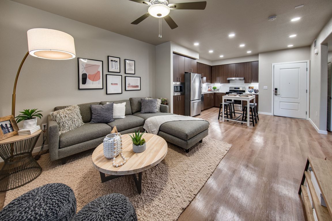 One bedroom model showing living room and kitchen