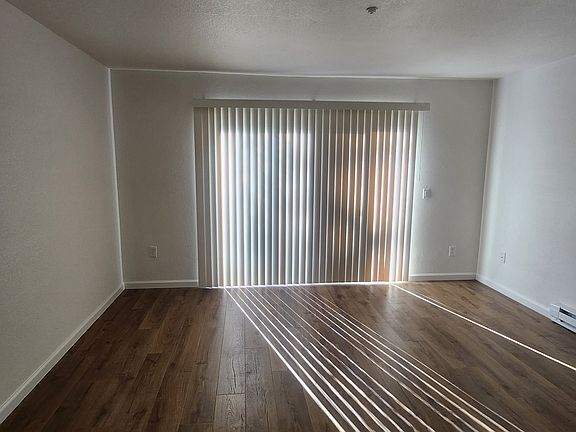 Living room - with patio door to private patio