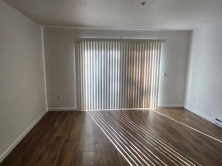 Living room - with patio door to private patio