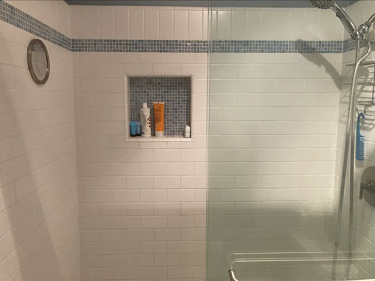 Clean walk in shower in the master bathroom