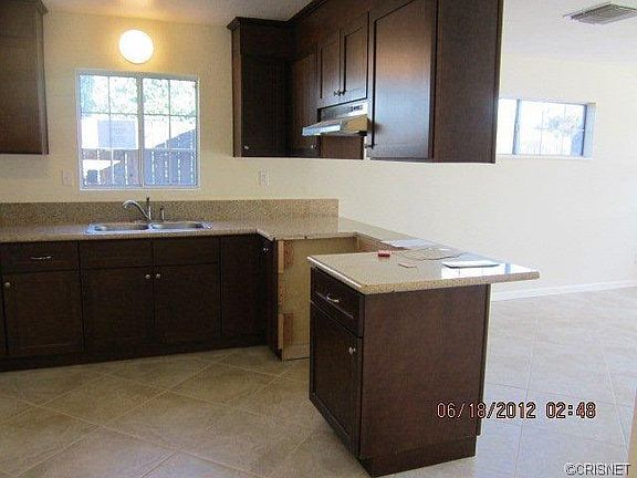 4th image of 15729 Romar St