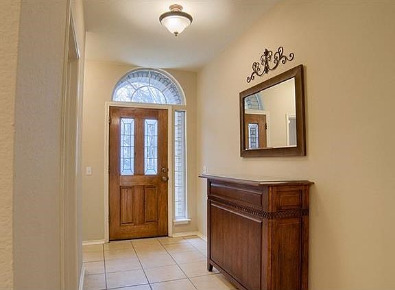 Welcome home! The charming entry will lead you to the cozy living room, formal dining and kitchen.