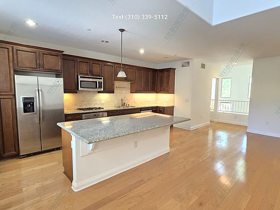 2nd image of 23121 Sherman Way #502
