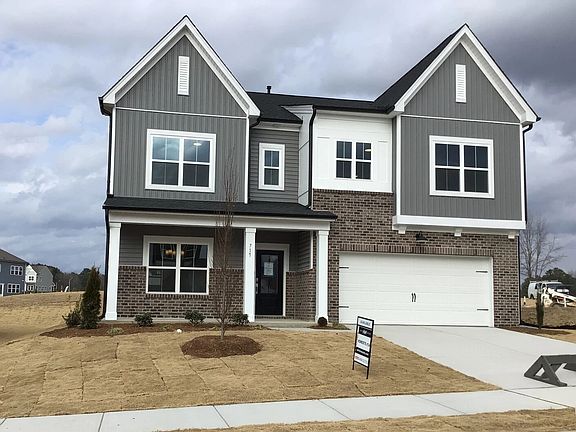 Exterior - Classic siding and a breezy coastal palette.