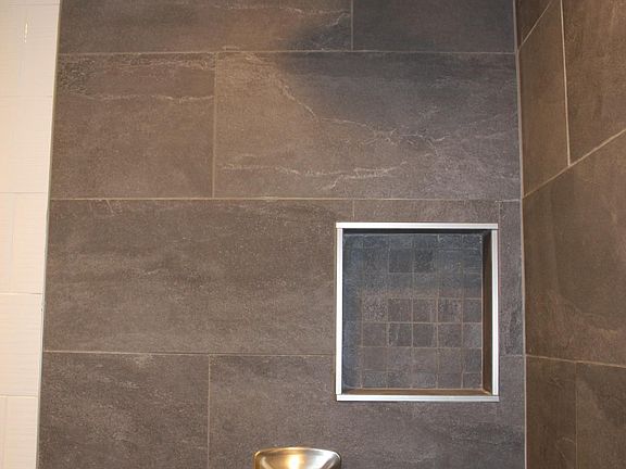 Rain Head Shower with Tiled Ceiling.