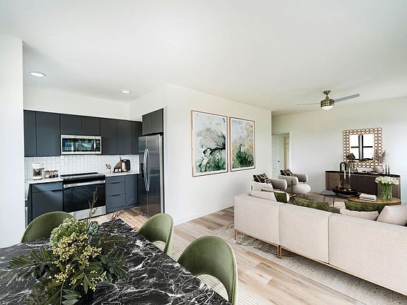 Stylish living and dining spaces designed for comfort and ease, all just moments from Tampa's Encore District at Modera Encore.