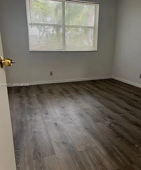 8801 Wiles Rd #305 — Photo 3