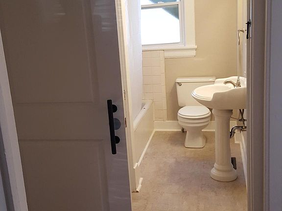 New Luxury Vinyl Tile and vanity sink.