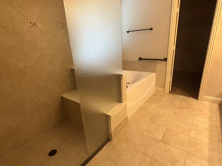 Primary bath with walk in shower and garden tub