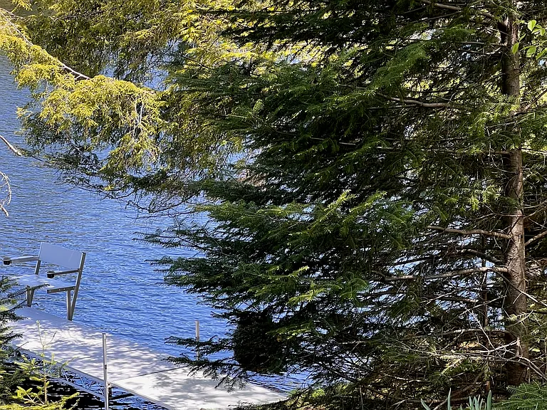looking down from hill at Ian's Place Watersmeet Mi Vacation Rental. Lake front property rental Upper Peninsula #VacationRental