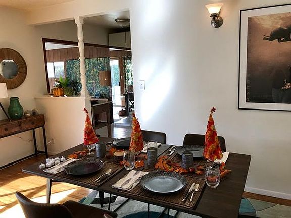 Dining area adjacent to living room.