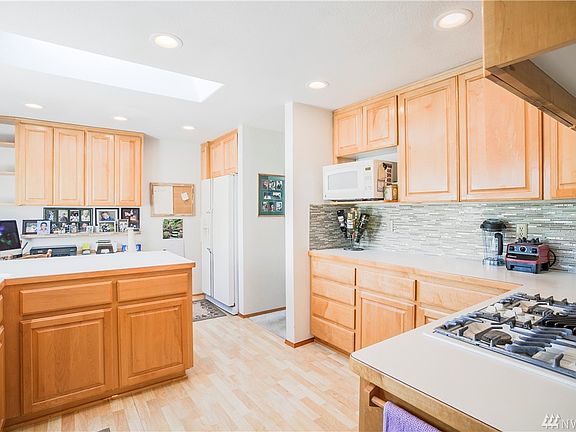 Kitchen and home command center. Glass-tile back splash and commanding views of the valley.