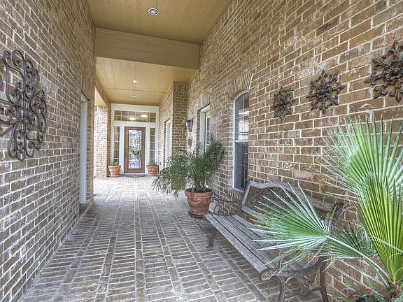 Brick courtyard entrance. The casita entrance is on the left. This home is in Creekside, near the ne