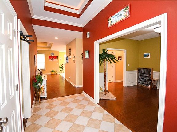 Dining room near entry and flows into kitchen/ living room area.
