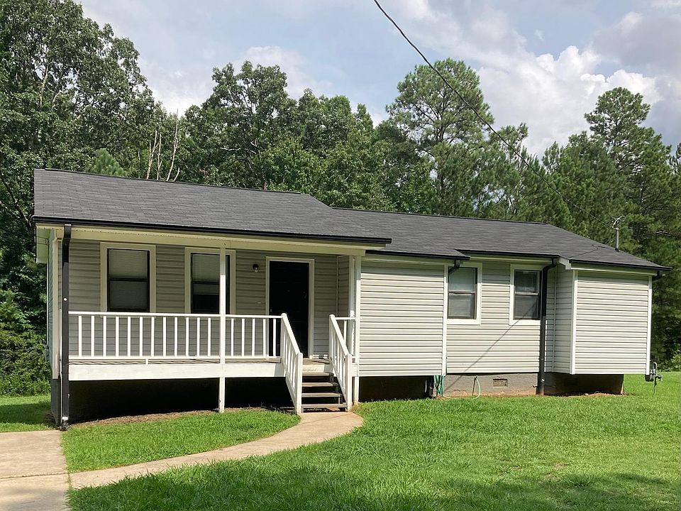 Front view of house. Photo shows distortions that are not there.