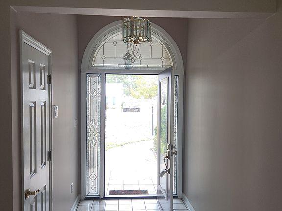 Entry way with hall closet