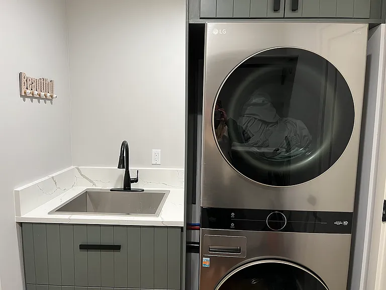 Laundry room. Closet storage located on opposite wall (not pictured).