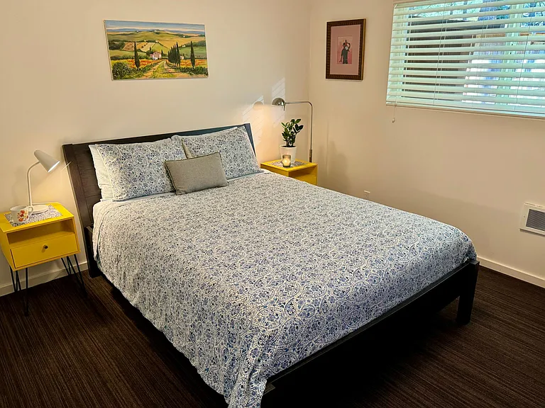 Primary bedroom with new queen mattress.