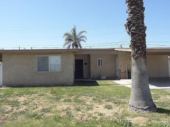 Large Front with 2 Car Carport