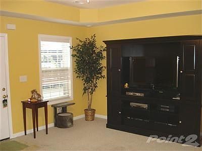 2" wood blinds throughout.