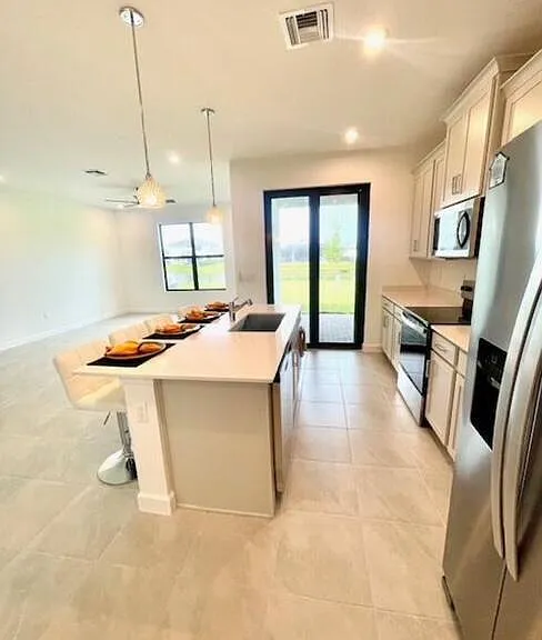 14043 SW Thorens Dr — Photo 3