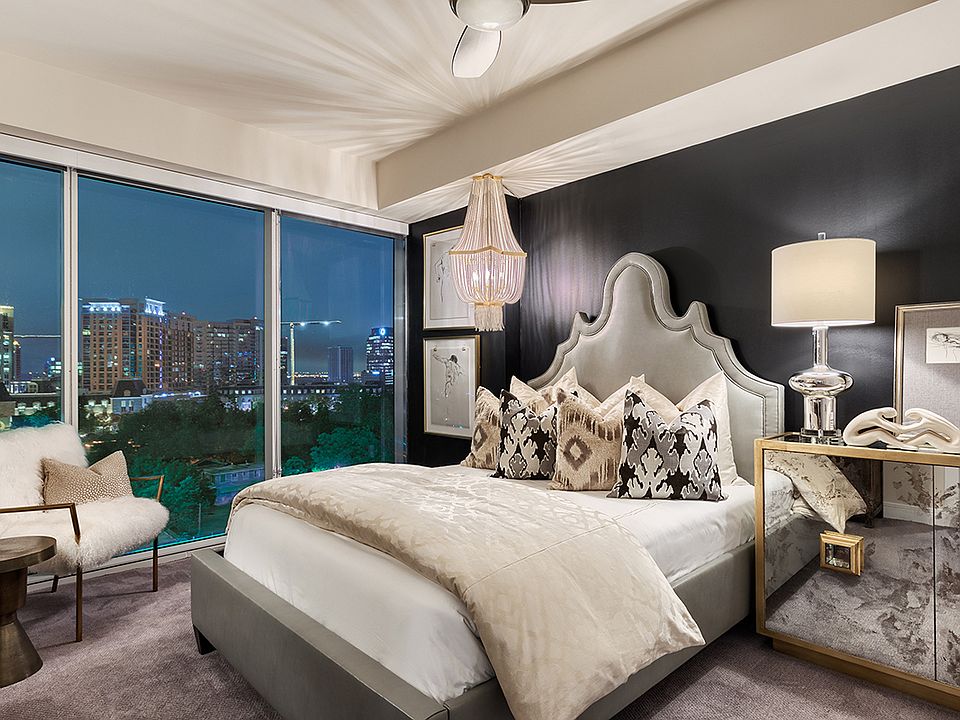 Modern bedrooms with expansive skyline views