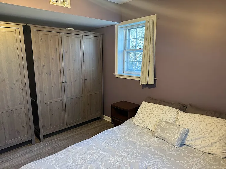 Two large wardrobes in the bedroom.