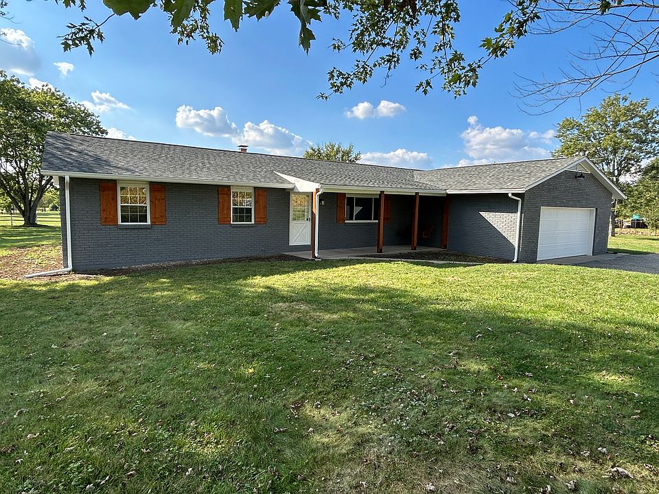 Front of house with new roof, new exterior paint and stain