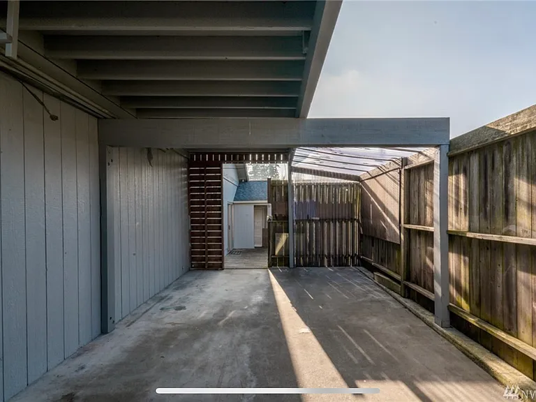 Bonus fenced, lockable carport, to breezeway to side deck.