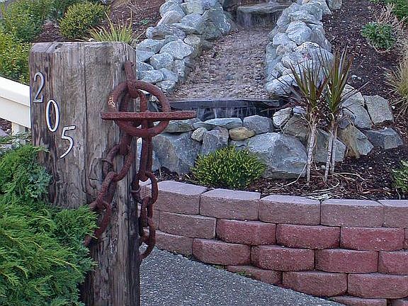 Beautiful fountain greets you in the front yard