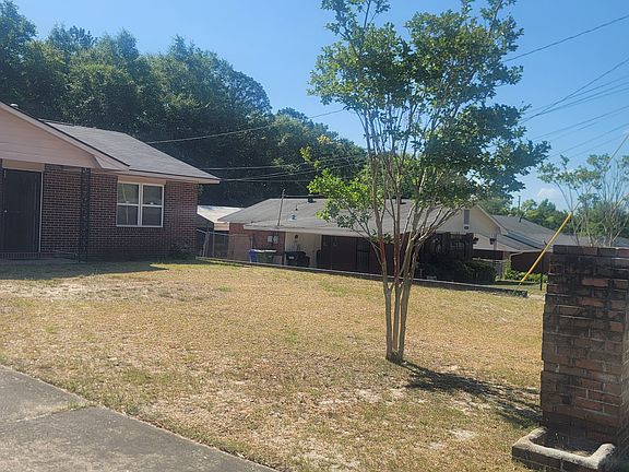 Left side of house showing level lot