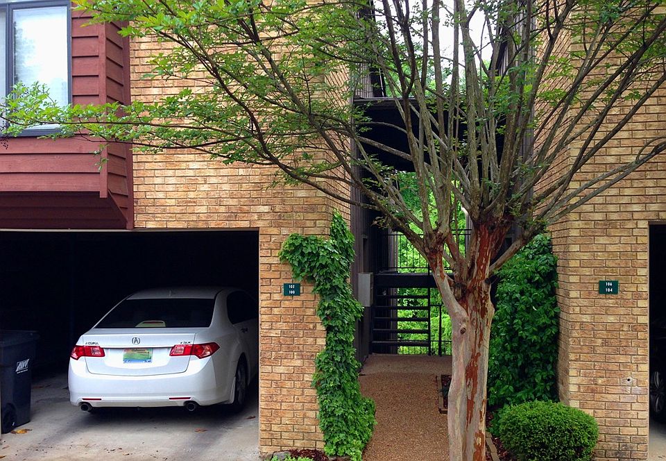 Covered parking with two locking storage rooms.