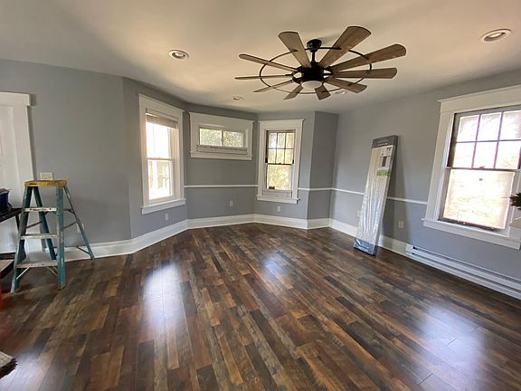 Living area with decorative fireplace.