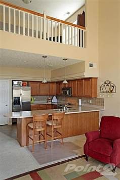 Beautiful cabinets with stainless steel appliances.