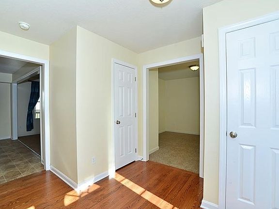 Foyer leads to Kitchen, Den, and Powder Room