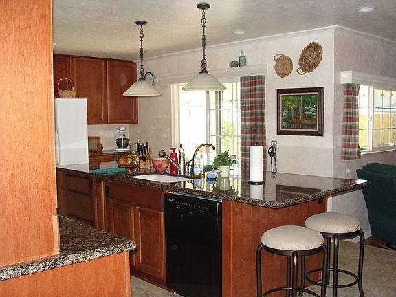 Kitchen with slab granite counter tops
