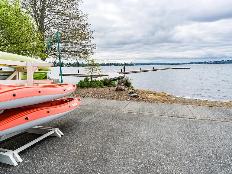 Waterfront access near Downtown Kirkland with kayak launches, scenic shoreline paths, and lakefront views supporting active outdoor living.